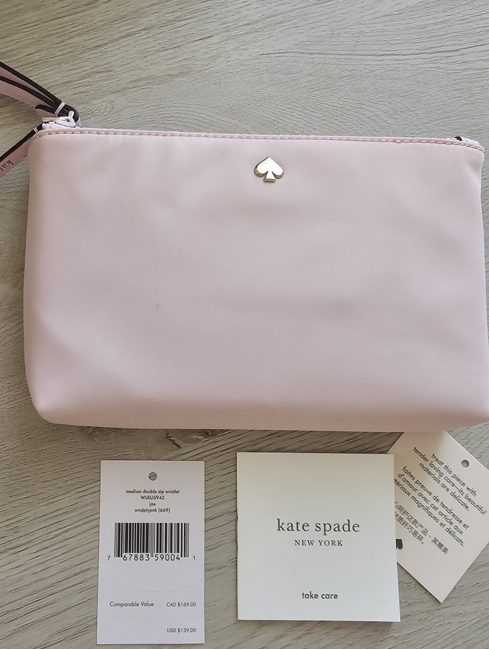 NWT Kate Spade Light Pink Wristlet Pouch with Gold Spade Accent